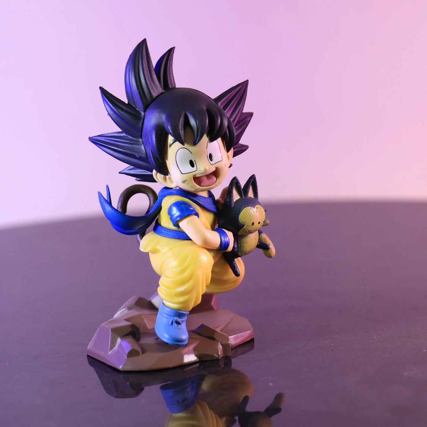 Kid Goku Holding Poole Figurine